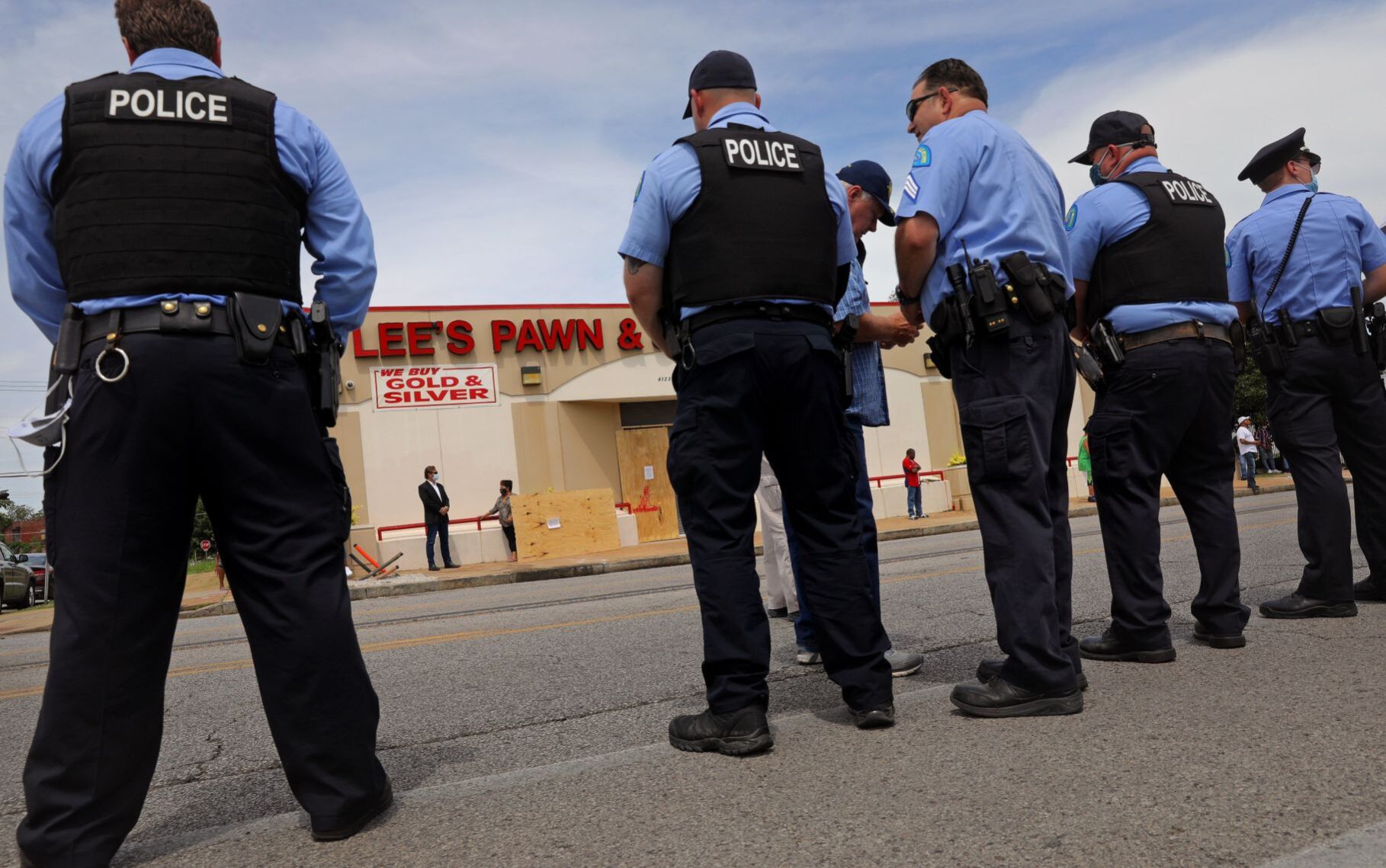 Loved ones remember David Dorn outside Lee's Pawn
